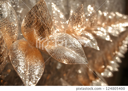 Sparkling Gold and Silver Decorative Leaves for Festive Holiday Decor and Design Generative AI 124805400