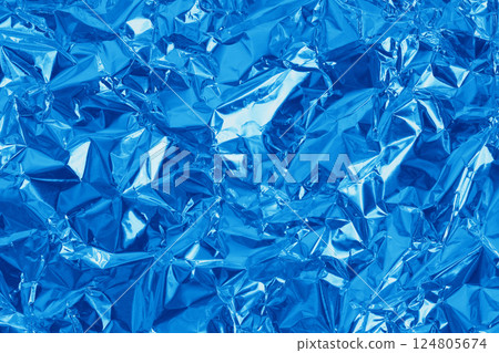 Blue foil leaf shiny texture, abstract wrapping paper for background and design art work. Blue foil leaf shiny texture, abstract wrapping paper for background and design art work. 124805674