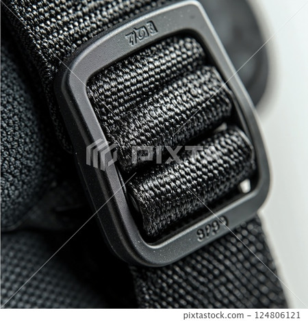 Durable black backpack strap buckle for outdoor adventure gear and safety equipment design 124806121