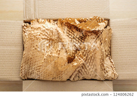 Eco friendly brown paper honeycomb wrap for product packaging parcel carton box Eco friendly brown paper honeycomb wrap for product packaging parcel carton box 124806262