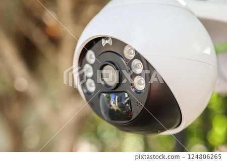 Security IP CCTV camera using solar energy install on the tree for home security system 124806265