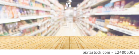 Empty wood table top with supermarket blurred background for product display 124806302