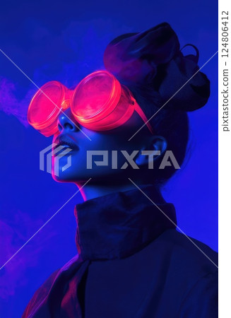Fashion photography a model with pink and blue lighting on her face. 124806412
