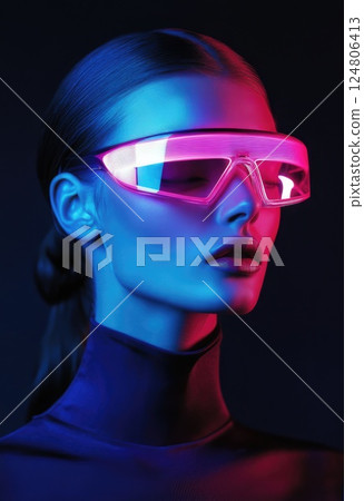 Fashion photography a model with pink and blue lighting on her face. 124806413