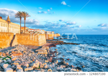 Amazing evening cityscape of historical part of Alghero town. Amazing evening cityscape of historical part of Alghero town. 124807100