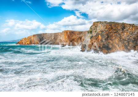 Unbelivable view of cliffs in valley Cala Domestica and storm on the sea Unbelivable view of cliffs in valley Cala Domestica and storm on the sea 124807145