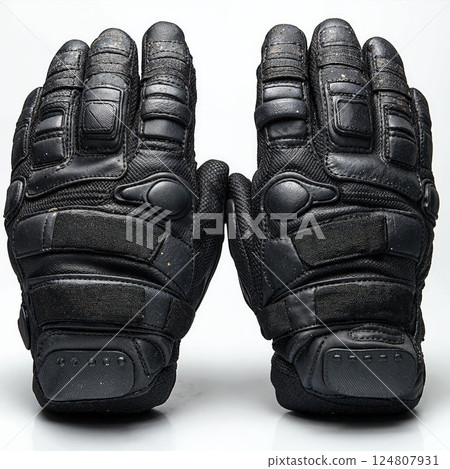 Black tactical gloves for outdoor adventure and extreme sports enthusiasts 124807931
