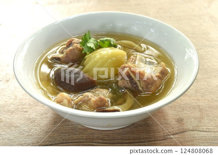 boiled pickled cabbage with pork bone and black mushroom in clear soup on bowl  124808068