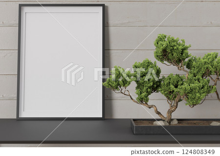 Elegant interior showcasing an empty picture frame alongside a beautifully shaped bonsai plant placed on a modern black shelf against a wooden wall, offering a perfect mockup for display. 3D render. 124808349