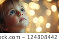 Enchanting Portrait of a Child Gazing at Lights 124808442