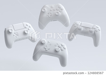 Set of flying gamer joysticks or gamepads on monochrome background 124808567
