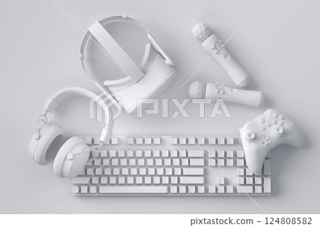 Top view gamer gears like joystick, keyboard, headphones and VR glasses 124808582