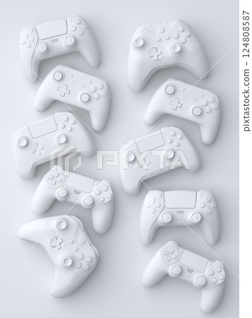 Set of lying gamer joysticks or gamepads on monochrome background Set of lying gamer joysticks or gamepads on monochrome background 124808587