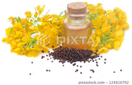 Mustard flowers with oil Mustard flowers with oil 124810702