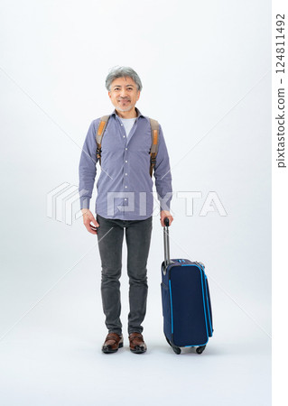 Full body photo of a senior man with a carry bag 124811492