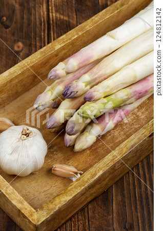 White peeled asparagus stalks. White peeled asparagus stalks. 124812142