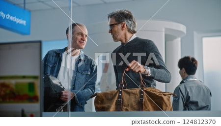 Airport Checkpoint: Diverse People with Bags During Security Check. X-ray Images of Luggage Scanning Airport Checkpoint: Diverse People with Bags During Security Check. X-ray Images of Luggage Scanning 124812370