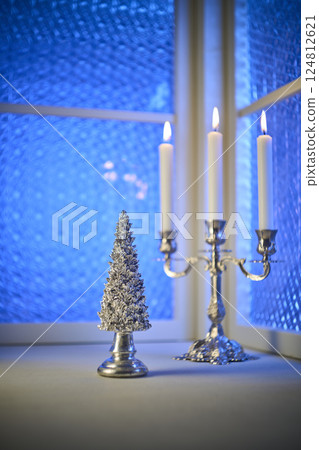 Christmas tree placed by the window Christmas image Christmas tree placed by the window Christmas image 124812621