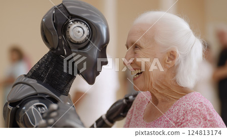 Elderly woman joyfully dancing with a robotic companion in a vibrant social gathering 124813174