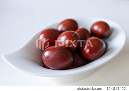 Chicken eggs painted red for Ester on white Chicken eggs painted red for Ester on white 124815422