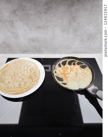 Cooking delicious crepes for shrove tuesday or maslenitsa celebration in prague 124815917