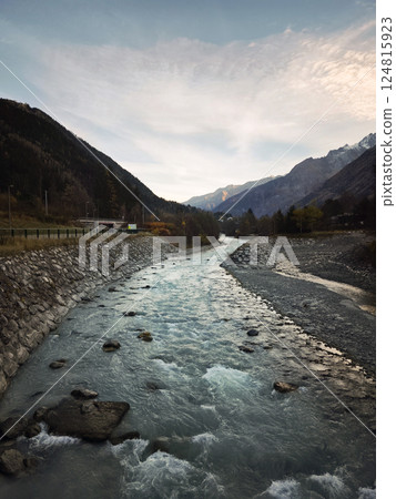 River arve flowing through chamonix valley in autumn 124815923