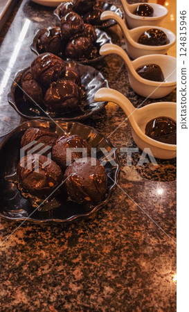 Chocolate balls displayed on countertop in marsa alam resort Chocolate balls displayed on countertop in marsa alam resort 124815946