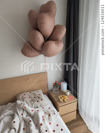 Romantic valentine's morning heart shaped balloons, breakfast, soft lighting, loving atmosphere Romantic valentine's morning heart shaped balloons, breakfast, soft lighting, loving atmosphere 124816011
