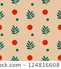 A pattern of leaves and red circles on a tan background 124816608