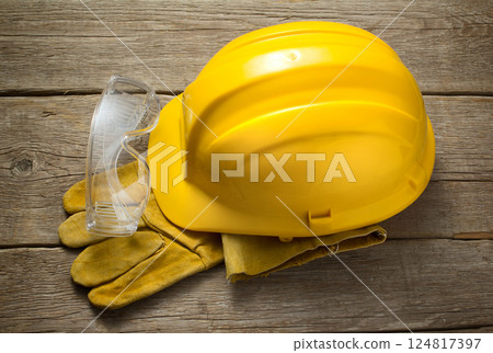 Working tool on wood background Working tool on wood background 124817397