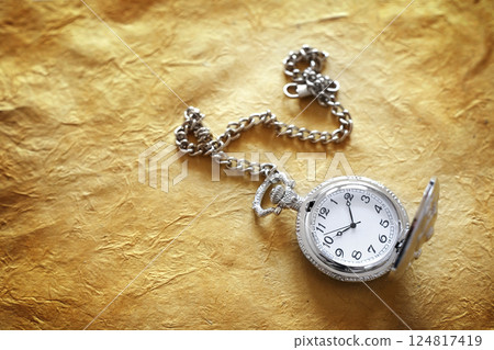 pocket watch on old paper pocket watch on old paper 124817419