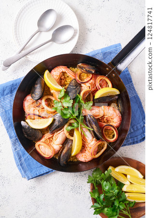 Paella made in a frying pan 124817741