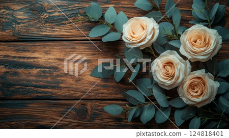 Elegant White Rose Bouquet with Subtle Greenery on Rustic Wooden Background 124818401