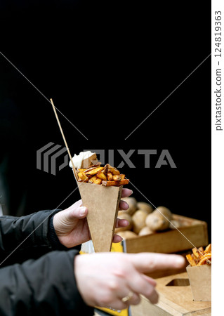 Street Food Fries In Paper Cone 124819363