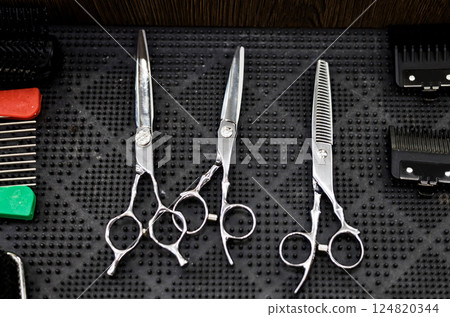 scissors on table in barbershop scissors on table in barbershop 124820344