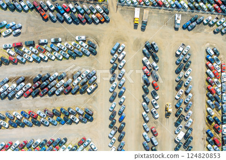 Abundant collection of cars trucks parked closely together in an open lot automotive sales second hand cars Abundant collection of cars trucks parked closely together in an open lot automotive sales second hand cars 124820853