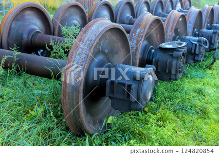 Rusty train wheels are is under restoration awaiting inspection of at railway yard. Rusty train wheels are is under restoration awaiting inspection of at railway yard. 124820854