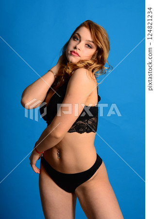 Young beautiful woman in a fashionable linen luxury blonde in the Studio. Young beautiful woman in a fashionable linen luxury blonde in the Studio. 124821234