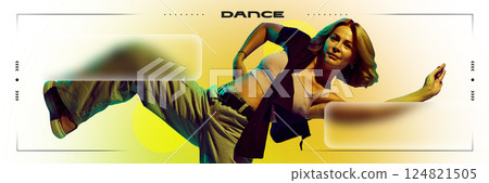 Flexible female dancer performing with passion under yellow-orange light with floating abstract shapes. 124821505