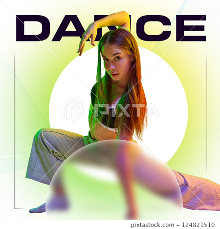 Flexible girl with intense gaze strikes low split pose with spotlight circle and glowing text, dancing hip hop. 124821510