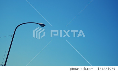 Street lights and blue sky 124821975