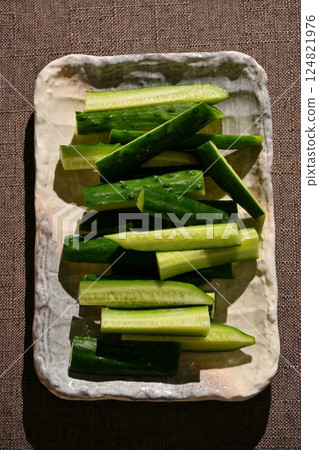Cut cucumber 124821976