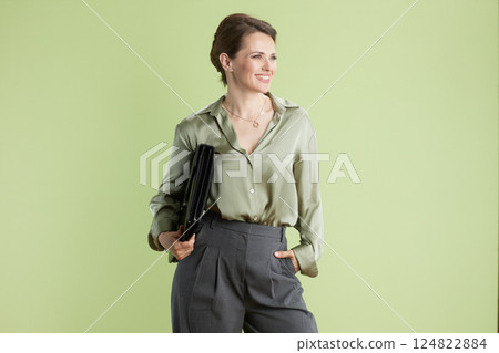 Confident professional woman with portfolio Confident professional woman with portfolio 124822884