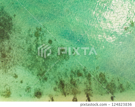 Sea surface aerial view,Bird eye view photo of waves water surface texture,Summer sea background,Beautiful nature Amazing view sea background 124823836