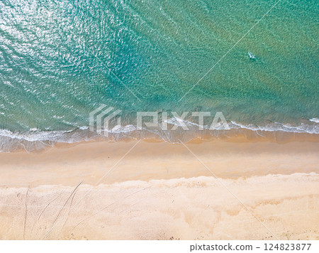 Sea surface aerial view,Bird eye view photo of waves water surface texture,Summer sea background,Beautiful nature Amazing view sea background 124823877