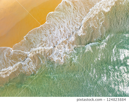 Sea surface aerial view,Bird eye view photo of waves water surface texture,Summer sea background,Beautiful nature Amazing view sea background 124823884