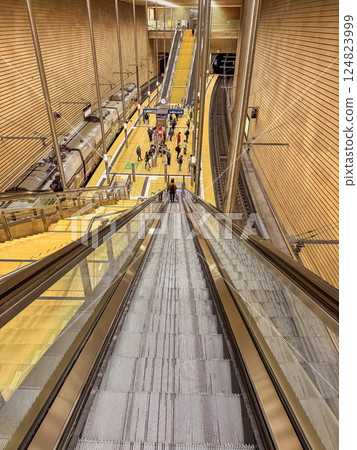 Subway Station Descent via Escalator, Modern Transit Hub, Urban Commute. High quality photo 124823999