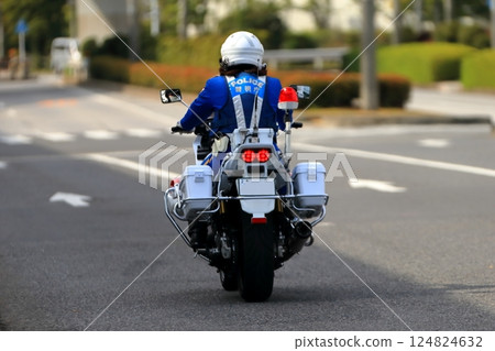 A police motorcycle on patrol A police motorcycle on patrol 124824632