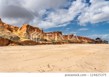 The rock formations at Canoa Quebrada Beach at Canoa Quebrada, state of Ceara, Brazil 124825375