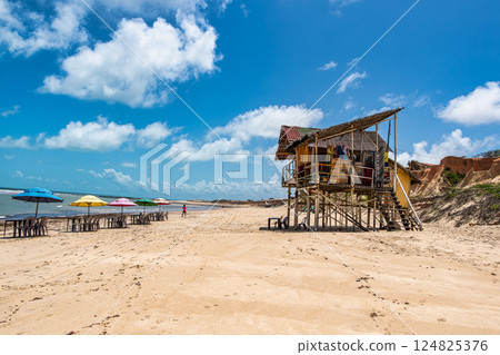 Famous barracas, bars and restaurants at Canoa Quebrada Beach, Brazil 124825376